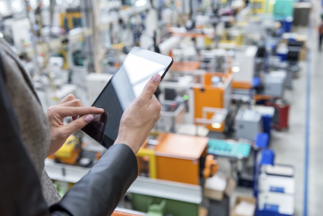 Employer Holding Ipad 