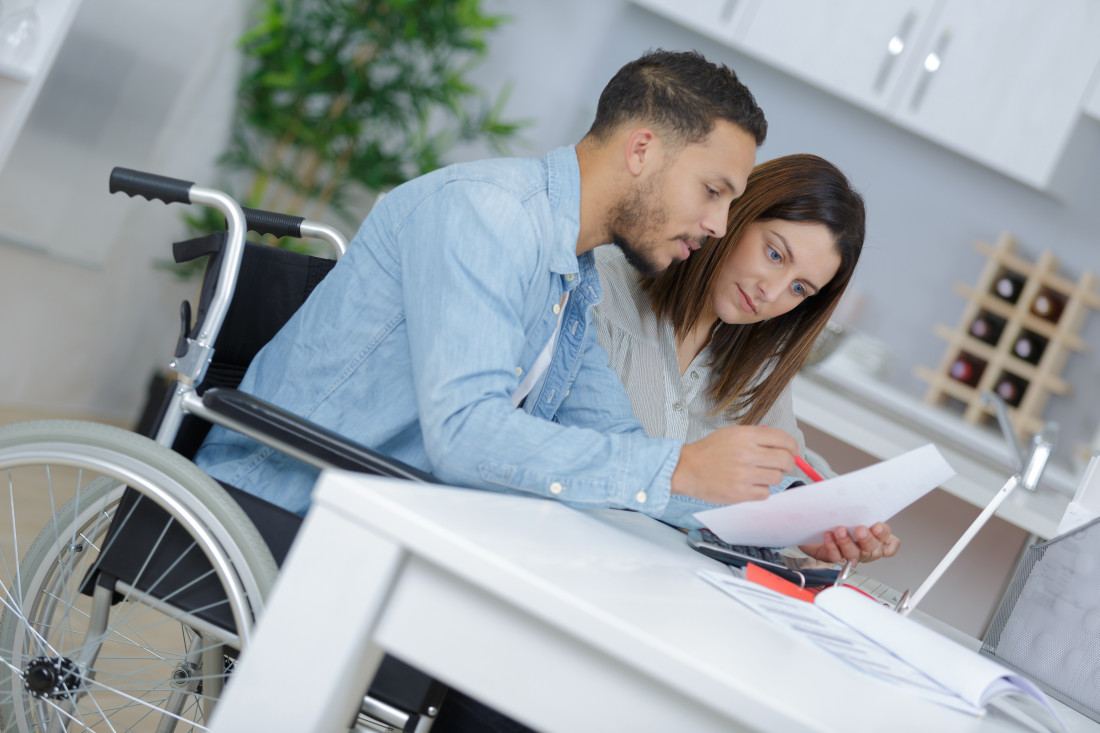 Couple looking at laptop