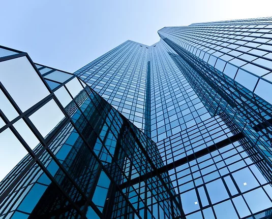 Tall building covered in windows.
