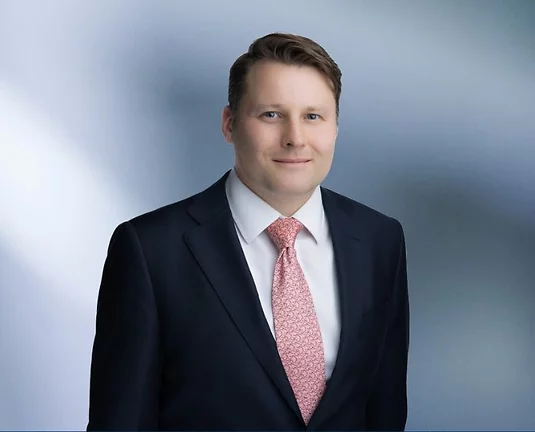 A picture of Ben Williams smiling at the camera.