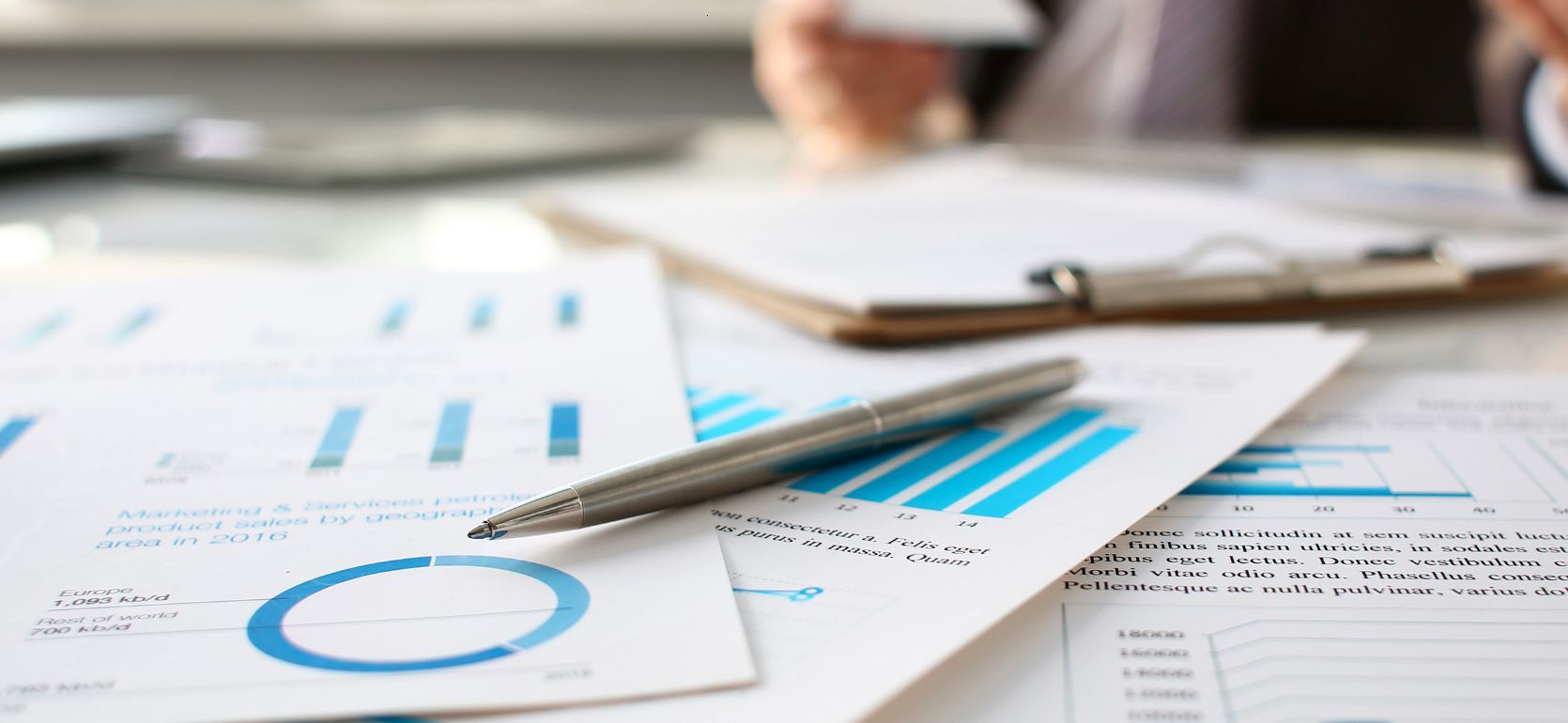 Papers with finance graphs on them.