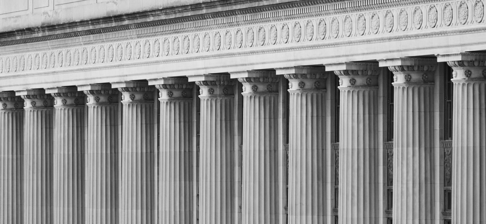 A line of Greek Corinthian columns.