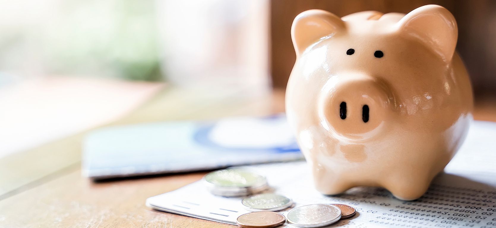 Piggy bank sitting on a table.