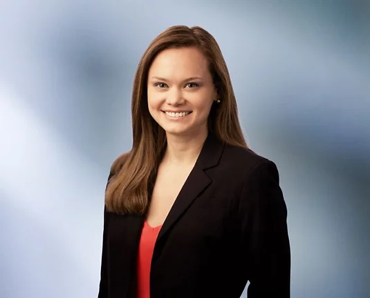 Picture of Leslie Abdoo smiling at the camera.