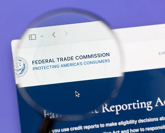 The Federal Trade Commission (FTC) website under magnifying glass