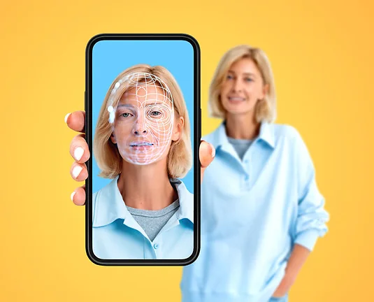 Woman showing phone and biometric scanning hologram, face swapping