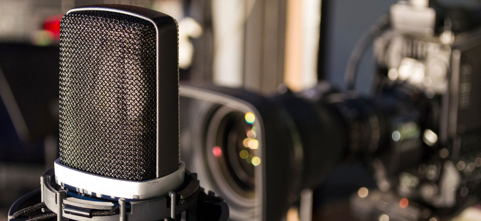 Retro microphone on stage a background of studio camera