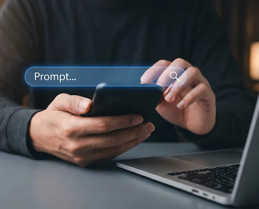 Person typing a search query into a smartphone with a search bar overlay