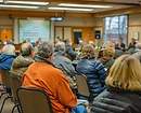 Community meeting thrives as residents gather for an insightful town hall meeting on local issues.