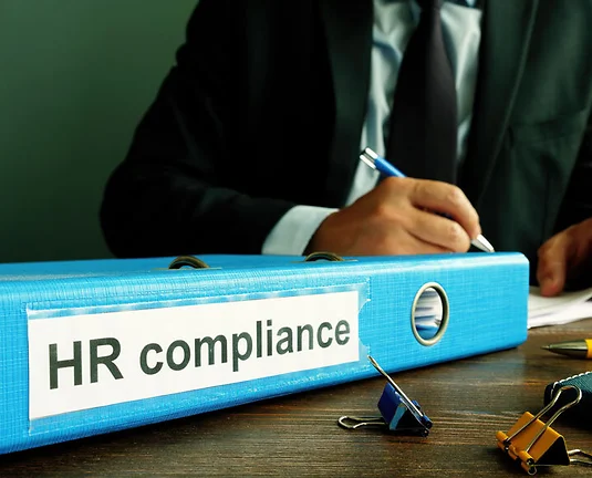 Folder with HR compliance papers and manager