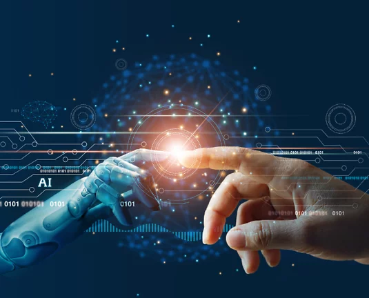 Close-up of a robotic hand and a human hand reaching toward each other, fingertips almost touching, with digital and AI elements in the background symbolizing artificial intelligence, innovation, and human-machine collaboration.